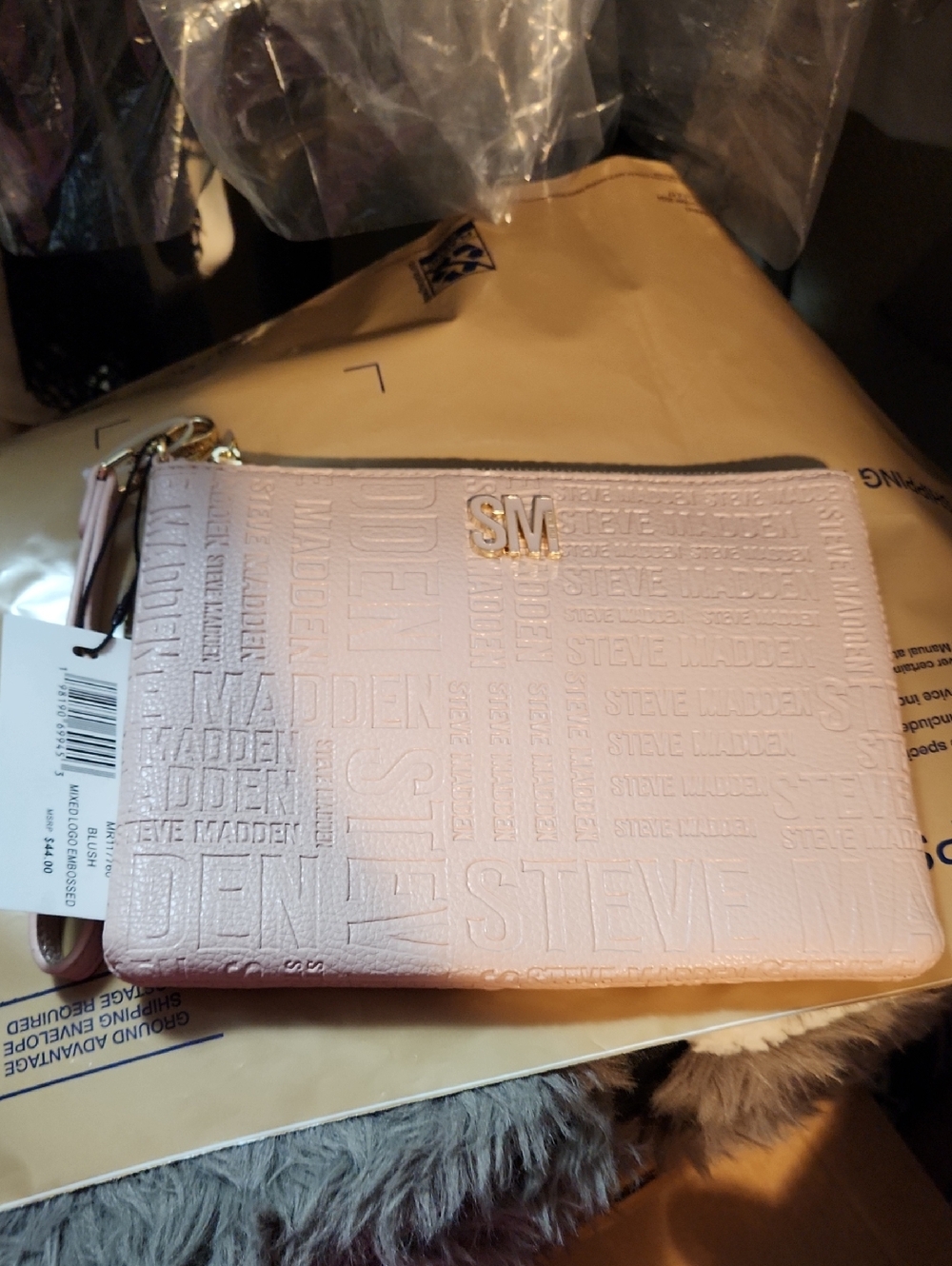 Steve Madden Light Pink Embossed Wristlet with Gold SM Accent